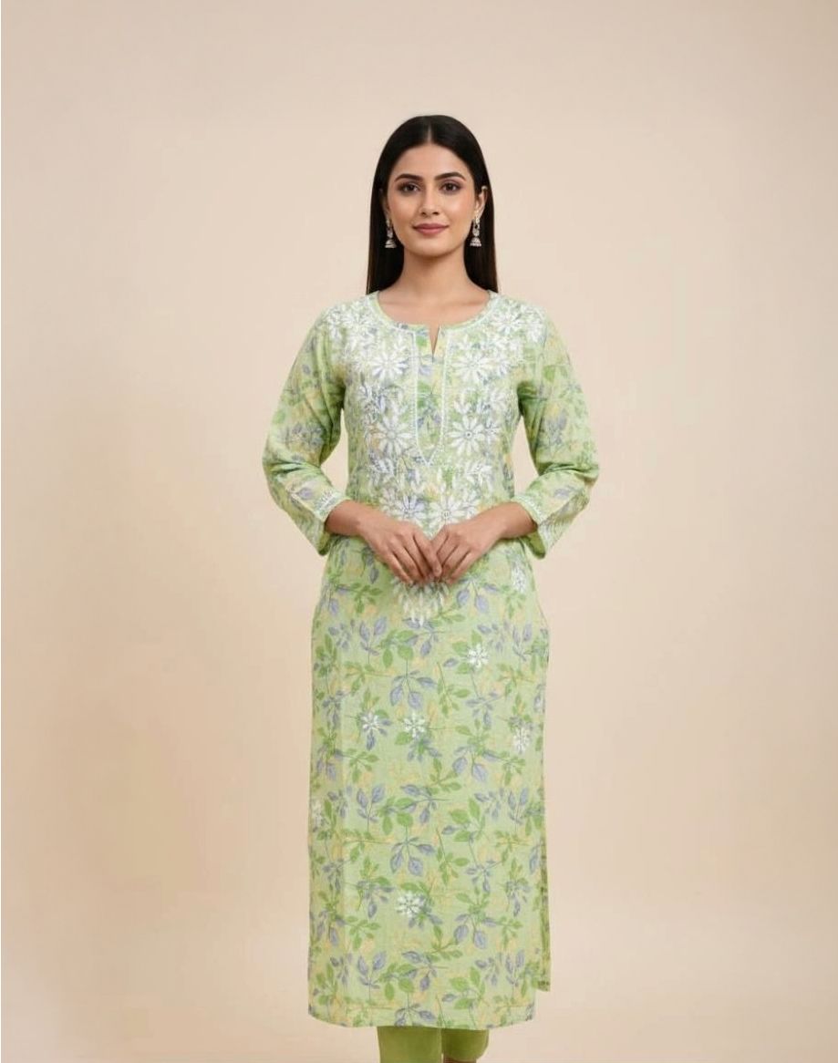 Pastel green cotton kurti with white floral thread embroidery and leaf print
